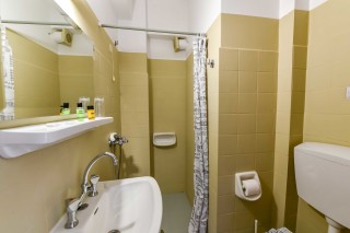 kitchenette apartment ionis hotel bathroom